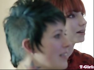 Inked transgirl straponfucked by redhead babe