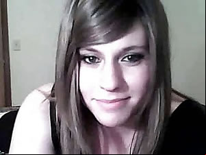 Cute brunette tranny enjoys oral sex on camera